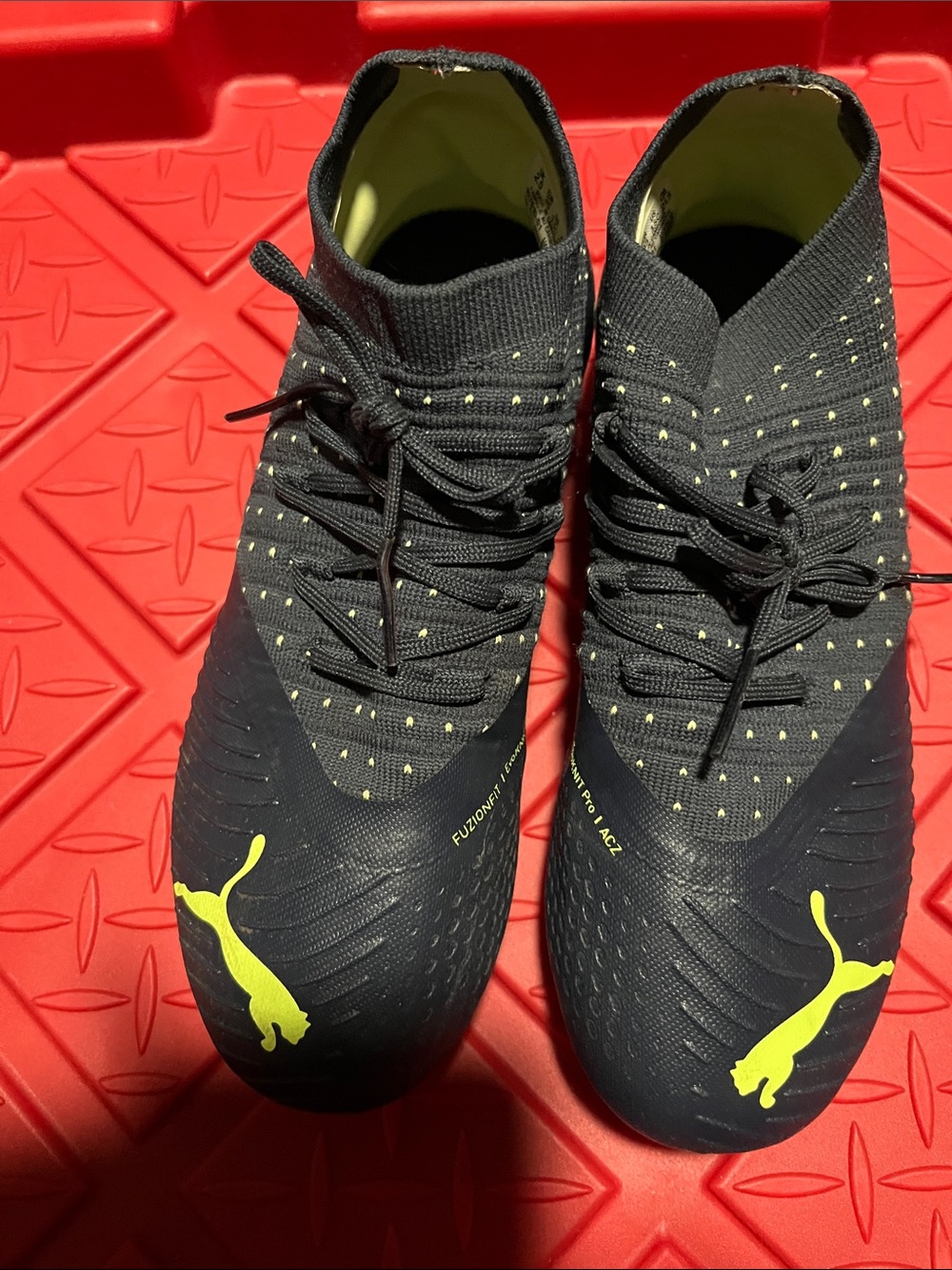 Puma Black and Yellow Youth size 3.5 Athletic Soccer Cleats
